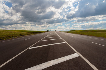 Fototapeta premium Highway. Open views and sunny weather to travel.