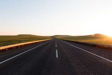 Highway. Open views and sunny weather to travel.
