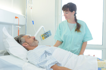 nurse talking to patient