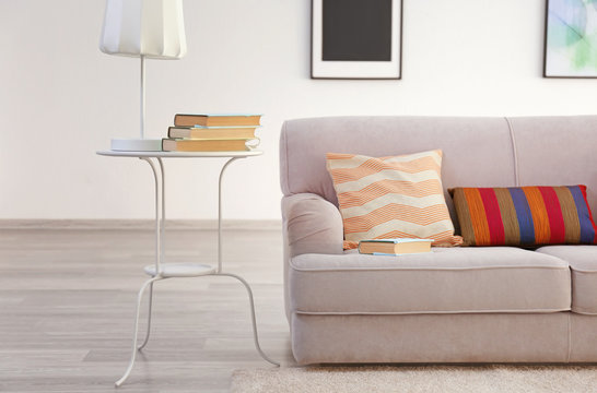 Modern living room with grey couch