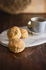 homemade scones with cheese in rustic setting