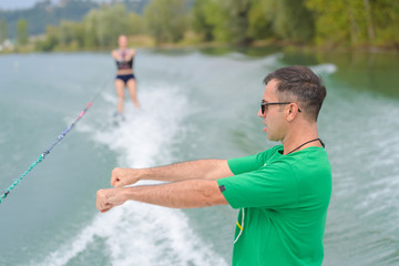 water ski girl listens to instructions from coach