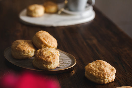 Homemade Scones With Cheese In Rustic Setting