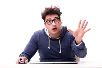 Funny nerd man working on computer isolated on white