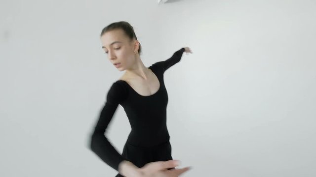 silhouette of ballerina in classical tutu in the white studio. 20s 1080p slow motion
