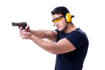 Man doing sport shooting from gun isolated on white