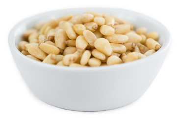Portion of Pine Nuts isolated on white