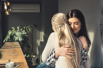 Young women friends in a coffee shop free time