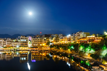 Agios Nikolaos, one of the most touristic cities on Crete island, at summer evening, Greece.