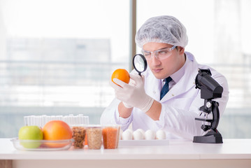 Nutrition expert testing food products in lab