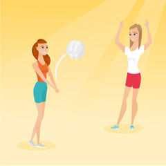 Two caucasian women playing beach volleyball.