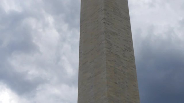 Looking up the DC Obelisk with Rain Clouds in the Background