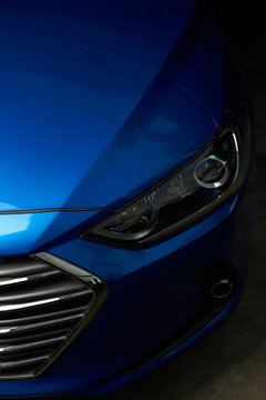 Fototapeta Elegant car headlight background