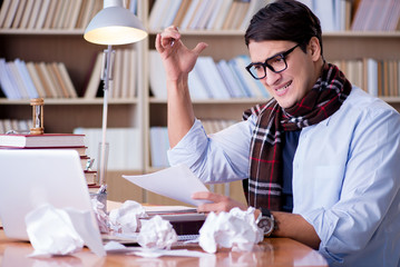 Young writer working in the library