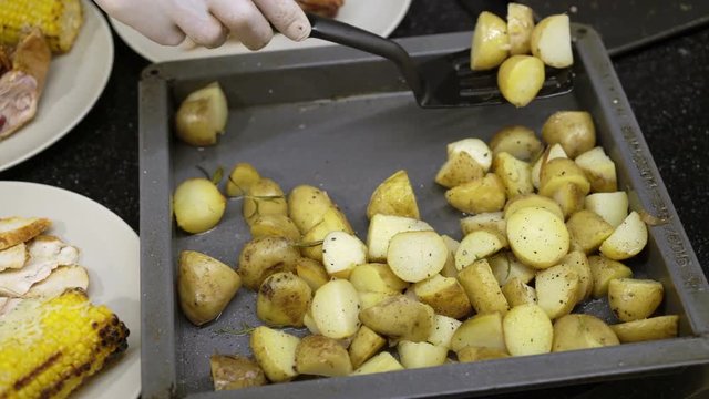 Cooking potato on grill closeup