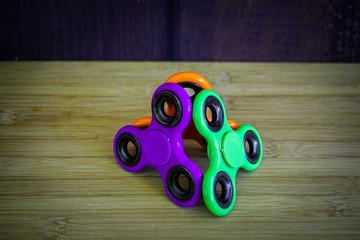 Colorful Fidget finger spinner stress, anxiety relief toy.