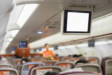 In-flight entertainment on airplane Display Screen,Aircraft monitor in passenger seat ,vintage color,selective focus,transport concept