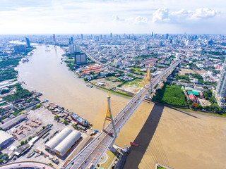 Aerial view of bridge cross river path into city, Bangkok