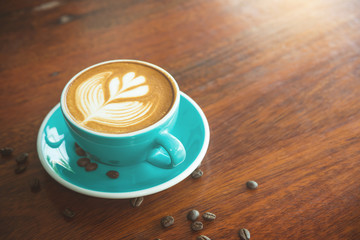 Coffee cup on wooden table