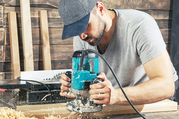 man equals  wooden with a milling machine © Виталий Сова