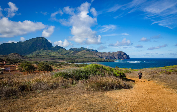 Hiker on Maha' elepu Heritage Trail, near Shipwreck Beach, Koloa, Kauai, Hawaii, USA