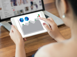  Analysis the Market  Business Team Investment Entrepreneur Trading checking stock market on tablet financial graph