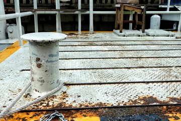 Rusty Mooring Bollard Pole on Pier.