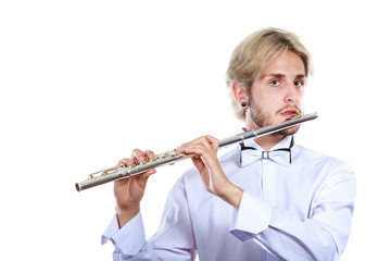 Male flutist playing his flute