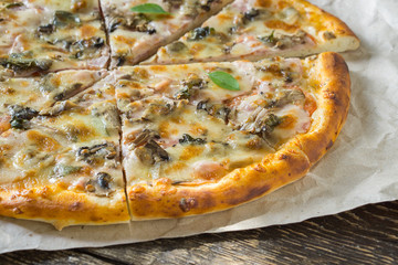 Pizza on rustic background