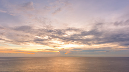 Naklejka na ściany i meble Sunset sky over tropical sea