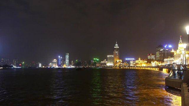 night of Shanghai Bund,huangpu river waterfront & Tourists crowded.