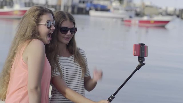 Fun Teen Girls Use Selfie Stick To Take Vacation Photos On Nantucket Island, MA