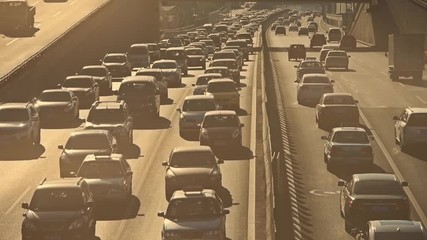 traffic on overpass,traffic jam in dust.