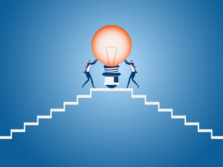 Business team carrying light bulb idea on stairs to target and success point. Stairs step to success