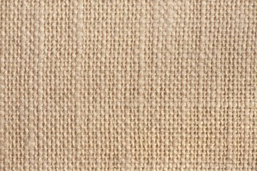 Abstract sackcloth background. Closeup of beige sackcloth texture