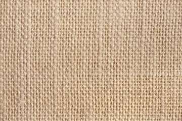 Abstract sackcloth background. Closeup of beige sackcloth texture
