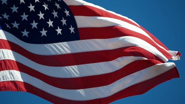 High quality video of United States flag waving in wind in slow motion 90fps