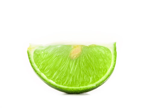 the fresh sliced lime with seed on white background