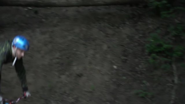 Dirt riding in the forest slow motion closeup