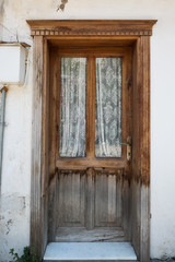 Old Rustic Front Foor with Windows and Curtains