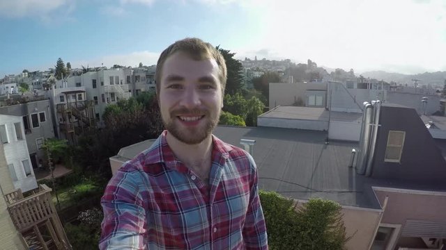 Happy Tourist Takes A Selfie On A Rooftop In San Francisco 