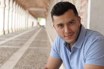 Fototapeta premium Cute boy smiling outdoors close up with copy space