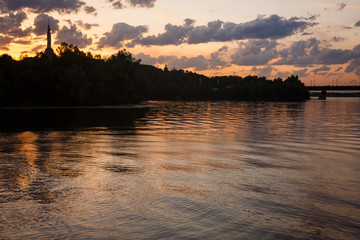 beautiful sunset river reflection of clouds water
