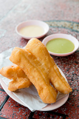 Oil-fried pastry or fried breadstick is a long golden-brown deep-fried strip of dough eaten in China and (by a variety of other names) in other East and Southeast Asian cuisines.