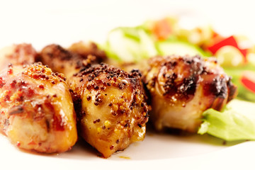 Mustard Chicken with Salad on a Plate (close up)