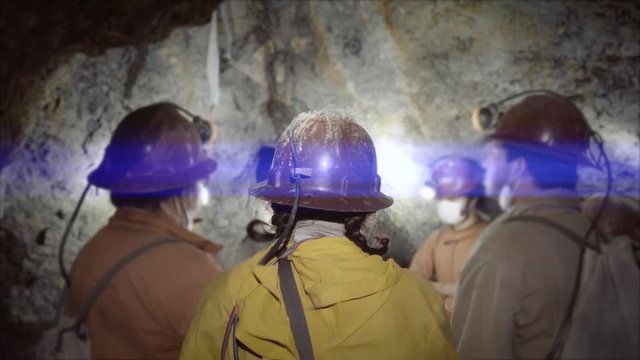 Board of mining engineers inside the mine, exploring the mineral veins in Cerro Rico, Bolivia. 4k	