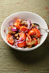 Fresh salad in white bowl