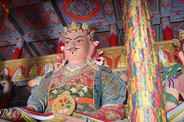 Tibetan and Chinese Figures in an Amdo Tibetan Monastery Temple in Qinghai Province China Asia