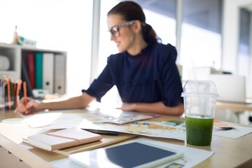 Female executive working at her desk