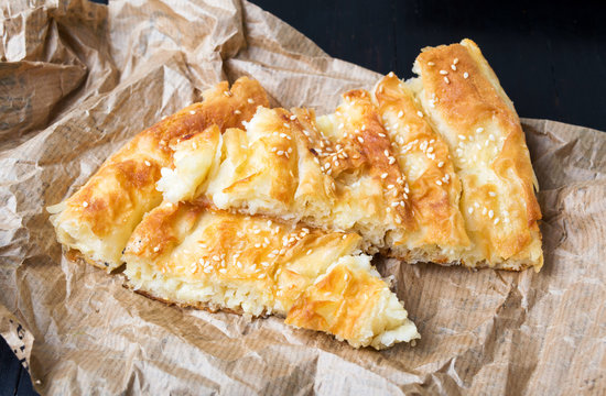 Cheese pie covered with sesame